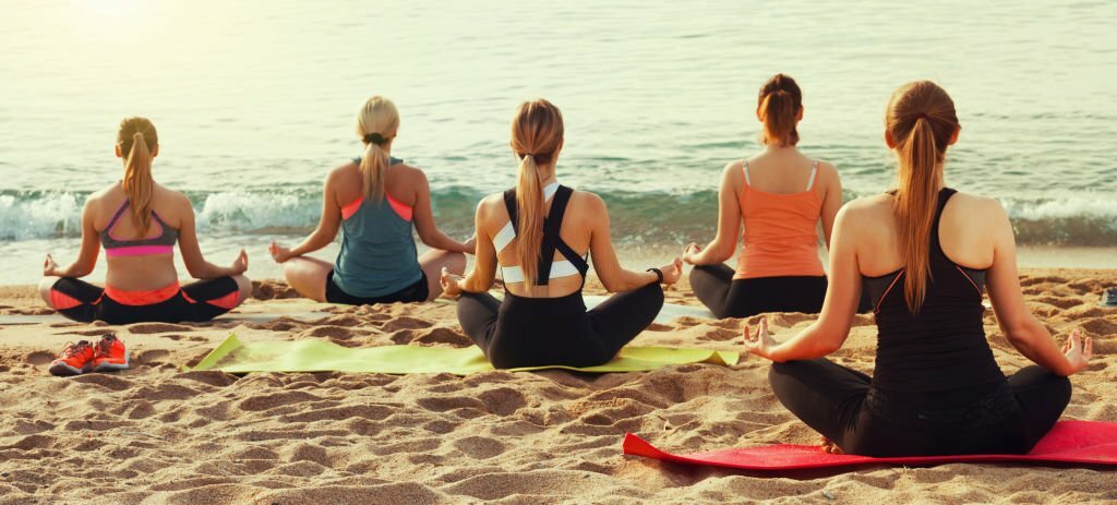 Elevating Unity: Exploring the Transformative World of Five People Yoga Poses